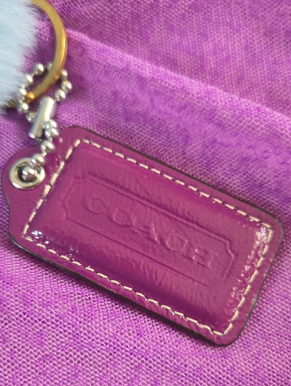 Coach Purple Leather Hangtag With Light Blue Fur Pom Pom Charm